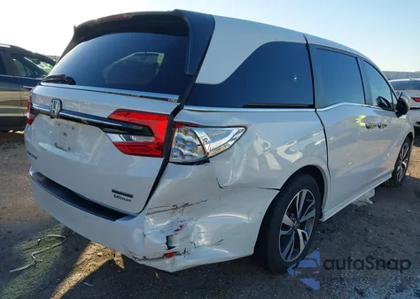 2021 Honda Odyssey Touring from USA, damaged, VIN 5FNRL6H80MB012183